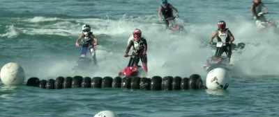 Burnett attacking
the log jump section, - Hot Water