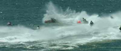 Burnett leads the pack into
the first turn, and yes, - Hot Water