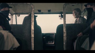 -[bus stops]
-[door squeaks] - The Handmaid's Tale