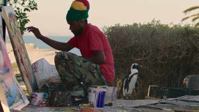 But a giant has set up camp. - Penguin Town