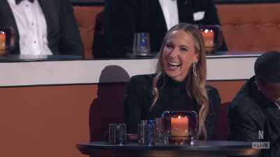 But every guy she dates
bends her over and takes a hike. - The Roast of Tom Brady