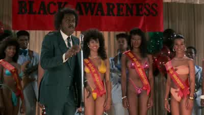 But you know when I look at these contestantsfor the miss black awareness pageantI feel goodI feel good 'cause I know there's a godSomewhere There's a god somewhereTurn around ladies for me pleaseYou know there's a godwho sits on high and looks down - Coming to America