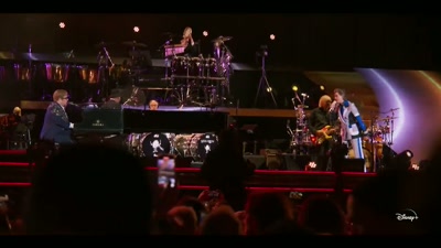 ♪ But losing everything is like the sun ♪ - Elton John Live: Farewell from Dodger Stadium