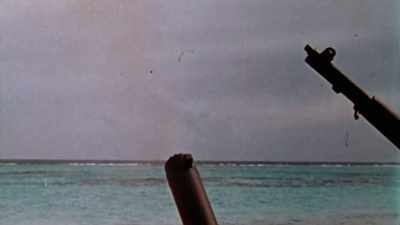 But not before the
American base takes a hit. - The Pacific War in Color