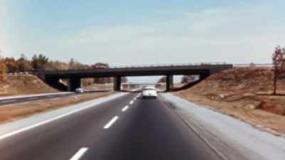 BUT THESE ROADS MAY ALSO
BE GOOD FOR MILITARY USE. - America in Color