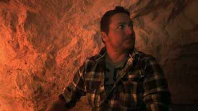 ..but Yani's not convinced
it's the right place. - Outback Opal Hunters