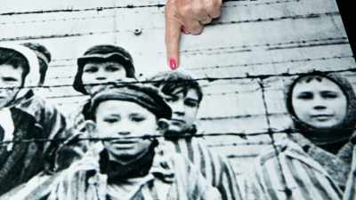 - By forgiving, - The Accountant of Auschwitz