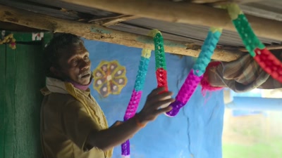 By working together with Bomman, - The Elephant Whisperers