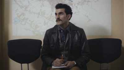 - (CACKLES)
- No, actually, - Comrade Detective