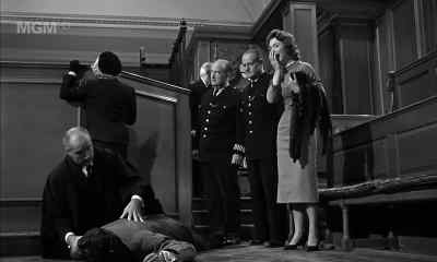 - Call a doctor.
- It's no use. No doctor can help now. - Witness for the Prosecution