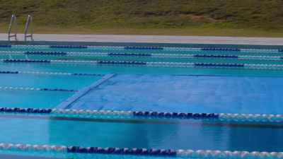 [calypso music continues] - Swimming for Gold
