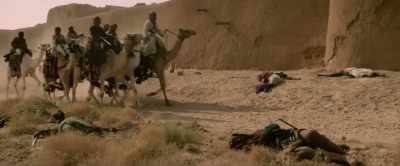 [Camels running, trumpet blows] - Born a King