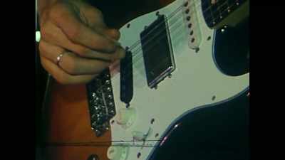 -[camera whizzing]
-["Used And Abused" playing] - Midnight Oil: The Hardest Line