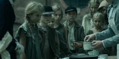 - Can I help?
- Yes, you can give the children bread. - A Fortunate Man