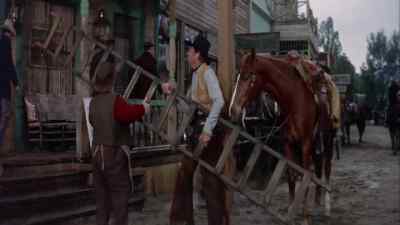 -Can I help you, partner?
-Please. - Man of the West