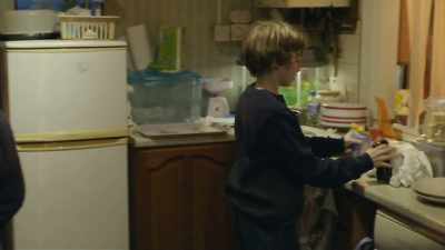 Candlelit vigil.
Must be working, all this, - The Moorside