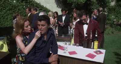 Can't you circulate among the guests?
Try to act like a very good host. - Black Gunn