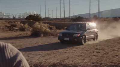 [car approaching with speed] - How to Blow Up a Pipeline