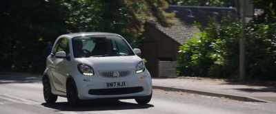 (car engine whirring) - This England