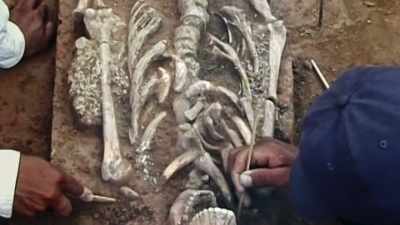 CARLA ALSO EXCAVATING
A LARGER MOUND NEARBY. - Lost Cities of the Amazon