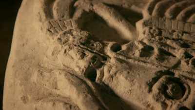 Carvings on the monument
contain clues - Lost Treasures of the Maya