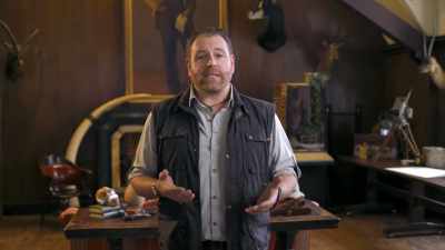 Case and point, if I say
fedora-wearing, - Tales From The Explorers Club