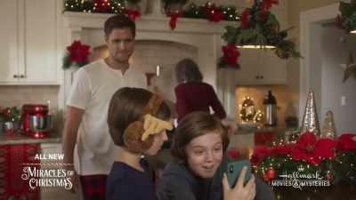 - CASEY: [OVER PHONE] Johnny boy!
- Hi, Mom! - A Godwink Christmas: Second Chance, First Love