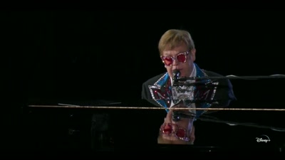 ♪ 'Cause he likes the name ♪ - Elton John Live: Farewell from Dodger Stadium