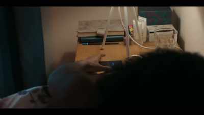 [cell phone buzzes] - The Capture
