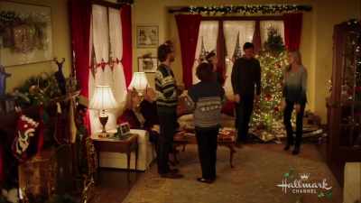 [cell phone rings] - Christmas Connection
