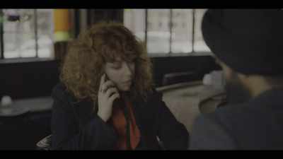 [cell phone vibrates] - Russian Doll