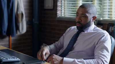 [cell phone vibrates] - Black Lightning