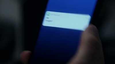 [ cellphone buzzes ] - All Rise