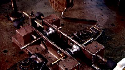 CERTAIN BENT TUBES ARE CONICAL,
OTHERS, CYLINDRICAL. - How It's Made