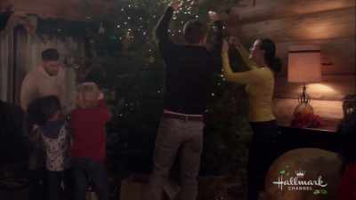 [chainsaw buzzing] - Christmas at Holly Lodge