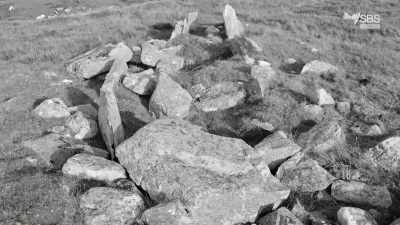 Chambered cairns made top targets
for artillery practice. - Scotland from the Sky