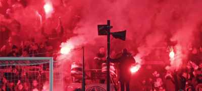 [chanting] - Football Must Go On