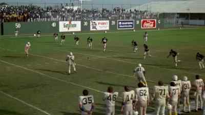 Charlie Blue Eyes
approaches the ball, - The Longest Yard