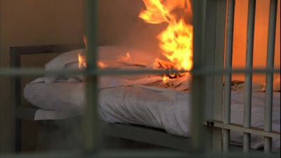 [ Chattering ]
[ Man On P.A. ]
Code red, Tier Three! - Burn Notice