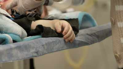 CHERNOV [voice-over]:
Kyryl, 18 months old. - 20 Days in Mariupol