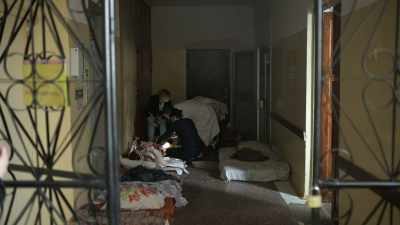 CHERNOV [voice-over]:
Patients are moved - 20 Days in Mariupol