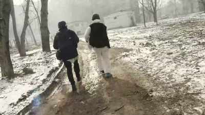 CHERNOV [voice-over]:
We run, - 20 Days in Mariupol