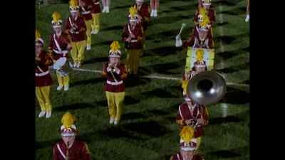CHICK (ON PA): How about
those marching Muskrats! - Ernest Goes to School