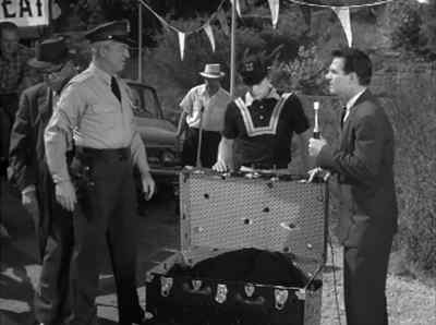 Chief Wallace will you
secure the lock, please? - Alfred Hitchcock Presents