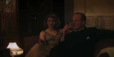 Chin-chin.
SHE LAUGHS - Agatha and the Midnight Murders