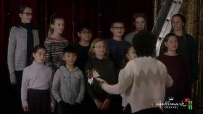 [Choir]: ♪ we wish you
a merry Christmas ♪ - Christmas in Evergreen