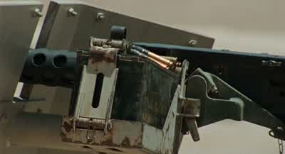 Chris is shooting wild. - The Hurt Locker