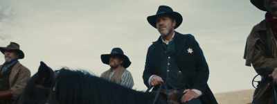 [chuckles, mutters indistinctly] - Old Henry