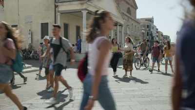 -(church bell ringing)
-(street chatter) - We Are Who We Are