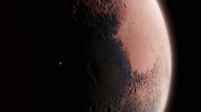 Circling above the planet's surface,
a new electronic eye. - Mars: One Day on the Red Planet